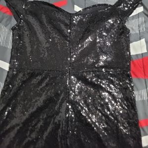 Classy Black Sequence Jumpsuit.   (XL)  I believe it will fit a size (L) Better